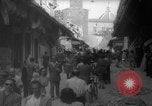 Image of Italian people crossing the war damaged Ponte Vecchio Bridge in Floren Florence Italy, 1945, second 38 stock footage video 65675053879