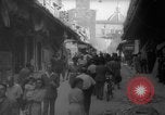 Image of Italian people crossing the war damaged Ponte Vecchio Bridge in Floren Florence Italy, 1945, second 41 stock footage video 65675053879