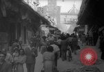 Image of Italian people crossing the war damaged Ponte Vecchio Bridge in Floren Florence Italy, 1945, second 42 stock footage video 65675053879