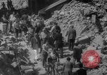 Image of Italian people crossing the war damaged Ponte Vecchio Bridge in Floren Florence Italy, 1945, second 44 stock footage video 65675053879