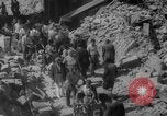Image of Italian people crossing the war damaged Ponte Vecchio Bridge in Floren Florence Italy, 1945, second 45 stock footage video 65675053879