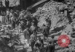 Image of Italian people crossing the war damaged Ponte Vecchio Bridge in Floren Florence Italy, 1945, second 46 stock footage video 65675053879