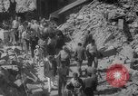 Image of Italian people crossing the war damaged Ponte Vecchio Bridge in Floren Florence Italy, 1945, second 47 stock footage video 65675053879