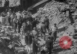 Image of Italian people crossing the war damaged Ponte Vecchio Bridge in Floren Florence Italy, 1945, second 48 stock footage video 65675053879