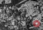 Image of Italian people crossing the war damaged Ponte Vecchio Bridge in Floren Florence Italy, 1945, second 49 stock footage video 65675053879