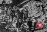 Image of Italian people crossing the war damaged Ponte Vecchio Bridge in Floren Florence Italy, 1945, second 50 stock footage video 65675053879