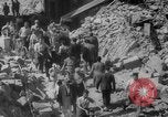 Image of Italian people crossing the war damaged Ponte Vecchio Bridge in Floren Florence Italy, 1945, second 51 stock footage video 65675053879
