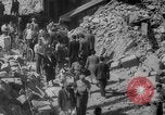 Image of Italian people crossing the war damaged Ponte Vecchio Bridge in Floren Florence Italy, 1945, second 53 stock footage video 65675053879