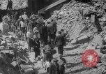 Image of Italian people crossing the war damaged Ponte Vecchio Bridge in Floren Florence Italy, 1945, second 55 stock footage video 65675053879