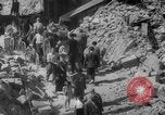 Image of Italian people crossing the war damaged Ponte Vecchio Bridge in Floren Florence Italy, 1945, second 56 stock footage video 65675053879