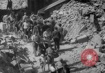 Image of Italian people crossing the war damaged Ponte Vecchio Bridge in Floren Florence Italy, 1945, second 57 stock footage video 65675053879