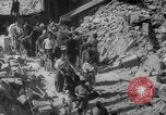 Image of Italian people crossing the war damaged Ponte Vecchio Bridge in Floren Florence Italy, 1945, second 59 stock footage video 65675053879