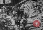 Image of Italian people crossing the war damaged Ponte Vecchio Bridge in Floren Florence Italy, 1945, second 60 stock footage video 65675053879