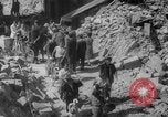 Image of Italian people crossing the war damaged Ponte Vecchio Bridge in Floren Florence Italy, 1945, second 61 stock footage video 65675053879