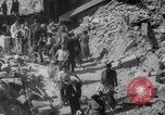 Image of Italian people crossing the war damaged Ponte Vecchio Bridge in Floren Florence Italy, 1945, second 62 stock footage video 65675053879