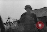 Standbild USA Soldaten SAINT MALO FRANKREICH, 1944, aus Sekunde 36 historischem Filmmaterial Videoclip 65675053897
