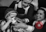Image of Wounded British pilots and children in hospitals during World War 2 United Kingdom, 1941, second 52 stock footage video 65675053960