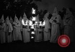 Image of Ku Klux Klan field induction ceremony Stone Mountain Georgia USA, 1935, second 27 stock footage video 65675054110
