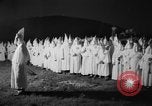 Image of Ku Klux Klan field induction ceremony Stone Mountain Georgia USA, 1935, second 45 stock footage video 65675054110