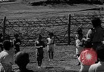 Image of native children Okinawa Ryukyu Islands, 1955, second 21 stock footage video 65675054145