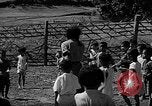 Image of native children Okinawa Ryukyu Islands, 1955, second 22 stock footage video 65675054145