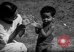 Image of native children Okinawa Ryukyu Islands, 1955, second 27 stock footage video 65675054145