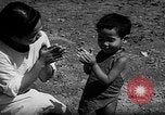 Image of native children Okinawa Ryukyu Islands, 1955, second 28 stock footage video 65675054145