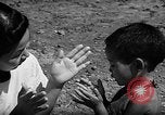 Image of native children Okinawa Ryukyu Islands, 1955, second 32 stock footage video 65675054145