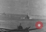 Image of USS Lexington (CV-2) attacked by Japanese airplanes Pacific Theater, 1942, second 48 stock footage video 65675054242