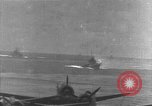 Image of USS Lexington (CV-2) attacked by Japanese airplanes Pacific Theater, 1942, second 49 stock footage video 65675054242
