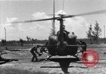 Image of U.S. Marine Corps UH-1E Huey gunship and  A-4 jet attack target Da Nang Vietnam, 1967, second 3 stock footage video 65675054269