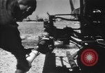 Image of U.S. Marine Corps UH-1E Huey gunship and  A-4 jet attack target Da Nang Vietnam, 1967, second 15 stock footage video 65675054269