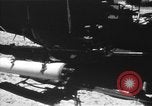 Image of U.S. Marine Corps UH-1E Huey gunship and  A-4 jet attack target Da Nang Vietnam, 1967, second 27 stock footage video 65675054269