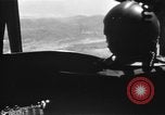 Image of U.S. Marine Corps UH-1E Huey gunship and  A-4 jet attack target Da Nang Vietnam, 1967, second 30 stock footage video 65675054269