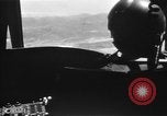 Image of U.S. Marine Corps UH-1E Huey gunship and  A-4 jet attack target Da Nang Vietnam, 1967, second 31 stock footage video 65675054269