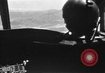 Image of U.S. Marine Corps UH-1E Huey gunship and  A-4 jet attack target Da Nang Vietnam, 1967, second 32 stock footage video 65675054269