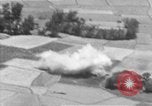 Image of U.S. Marine Corps UH-1E Huey gunship and  A-4 jet attack target Da Nang Vietnam, 1967, second 58 stock footage video 65675054269