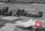 Image of U.S. Marine Corps UH-1E Huey gunship and  A-4 jet attack target Da Nang Vietnam, 1967, second 59 stock footage video 65675054269