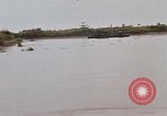 Immagine di Mobile forza fluviali barche in Vietnam Delta del Mekong Vietnam, 1968, secondo 34 filmato di repertorio 65675054294