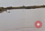 Immagine di Mobile forza fluviali barche in Vietnam Delta del Mekong Vietnam, 1968, secondo 35 filmato di repertorio 65675054294