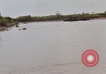 Immagine di Mobile forza fluviali barche in Vietnam Delta del Mekong Vietnam, 1968, secondo 37 filmato di repertorio 65675054294