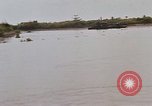 Immagine di Mobile forza fluviali barche in Vietnam Delta del Mekong Vietnam, 1968, secondo 40 filmato di repertorio 65675054294