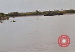 Immagine di Mobile forza fluviali barche in Vietnam Delta del Mekong Vietnam, 1968, secondo 42 filmato di repertorio 65675054294