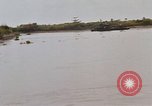 Immagine di Mobile forza fluviali barche in Vietnam Delta del Mekong Vietnam, 1968, secondo 43 filmato di repertorio 65675054294