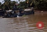 Immagine di Mobile forza fluviali barche in Vietnam Delta del Mekong Vietnam, 1968, secondo 44 filmato di repertorio 65675054294