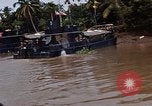 Immagine di Mobile forza fluviali barche in Vietnam Delta del Mekong Vietnam, 1968, secondo 46 filmato di repertorio 65675054294