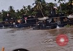 Immagine di Mobile forza fluviali barche in Vietnam Delta del Mekong Vietnam, 1968, secondo 51 filmato di repertorio 65675054294