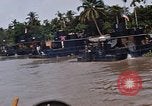 Immagine di Mobile forza fluviali barche in Vietnam Delta del Mekong Vietnam, 1968, secondo 52 filmato di repertorio 65675054294