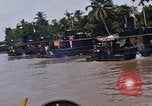 Immagine di Mobile forza fluviali barche in Vietnam Delta del Mekong Vietnam, 1968, secondo 53 filmato di repertorio 65675054294