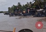 Immagine di Mobile forza fluviali barche in Vietnam Delta del Mekong Vietnam, 1968, secondo 58 filmato di repertorio 65675054294